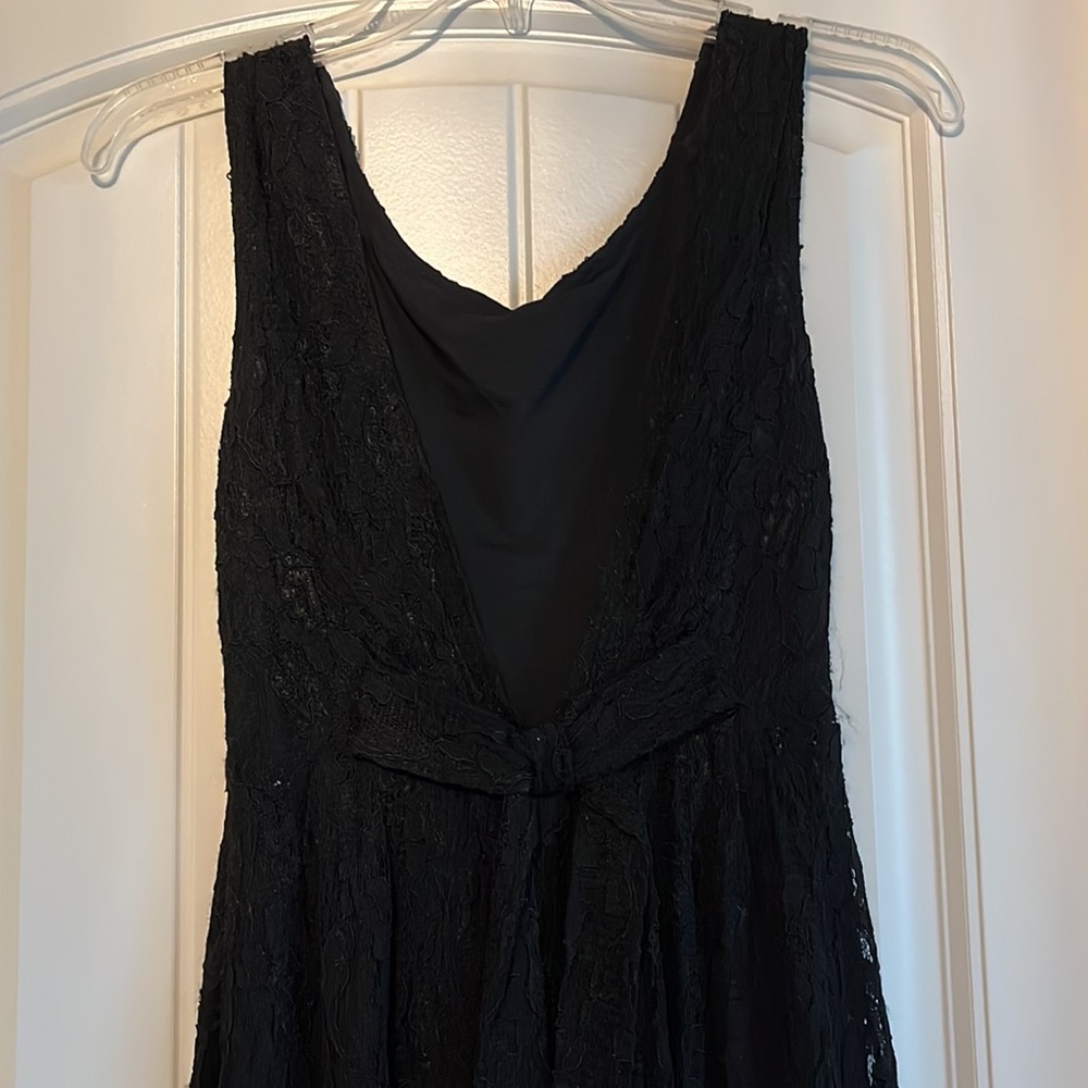 Lace open back mini black dress